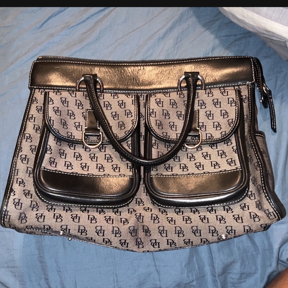 Gently used grey and black Dooney and Bourke